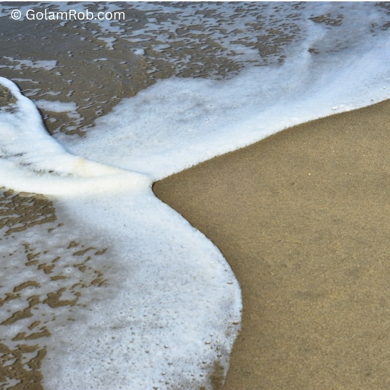 Close-up of coastal erosion texture and sediment patterns for AI segmentation